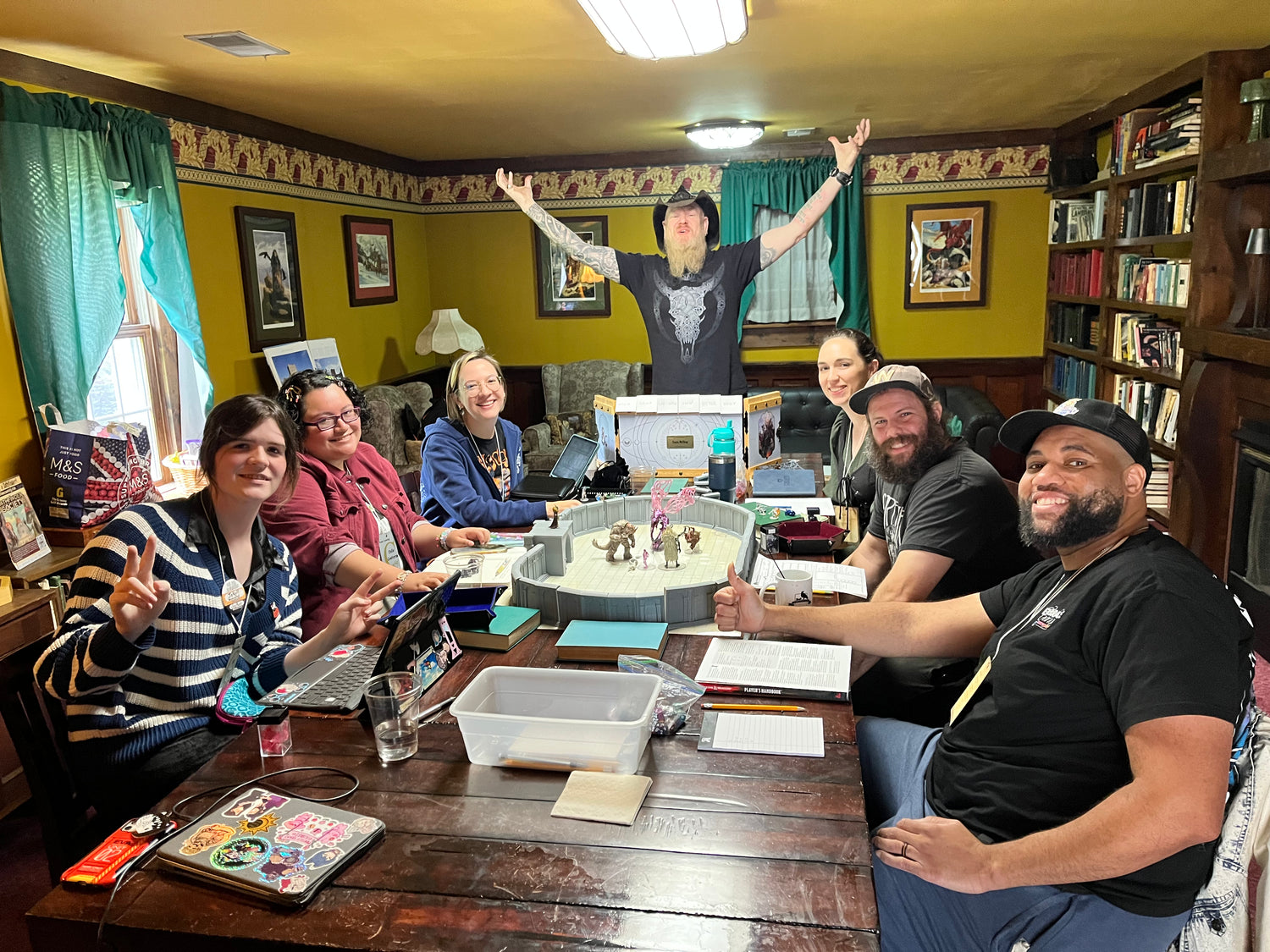 Dungeon Master Jason Charles Miller celebrates as his players escape his campaign Dome of Doom during Champions Grove 2025.